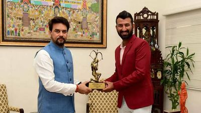 India batter Cheteshwar Pujara receives his 2017 Arjuna Award trophy