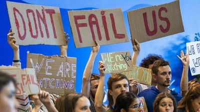 Climate summit brings historic deal on climate damage, stalls on cuts