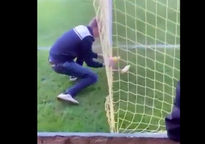Goalkeeper sent off after confronting fan who allegedly urinated in his bottle