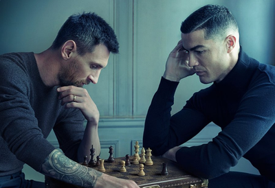 Fans look for clues to reveal the true GOAT as Lionel Messi and Cristiano Ronaldo play chess in new advert