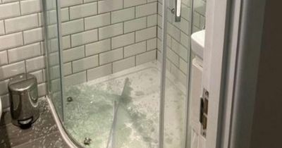 A shower screen 'exploded' without warning leaving a woman astonished