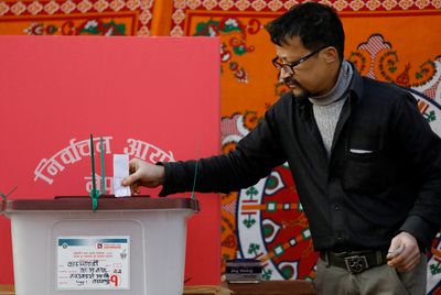 Nepal votes to elect new government to revive economy