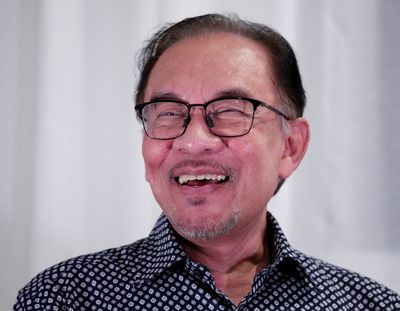 Malaysia's Anwar 'optimistic' of forming govt after talks with potential partners