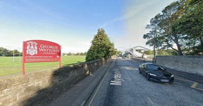 Cyclist rushed to Edinburgh hospital after falling outside school on black ice