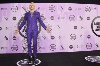 Machine Gun Kelly dons extravagant spiked suit at the AMAs