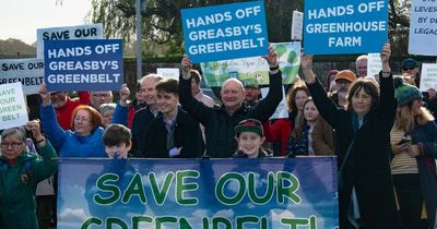 Hundreds protest against controversial plans to build 240 homes