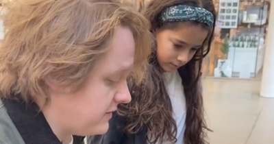 Sweet moment Lewis Capaldi teaches young fan his new song on train station piano