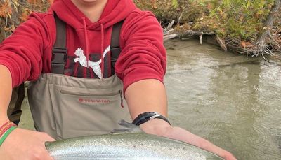 A 13-year-old catches his first Atlantic salmon while spey fishing