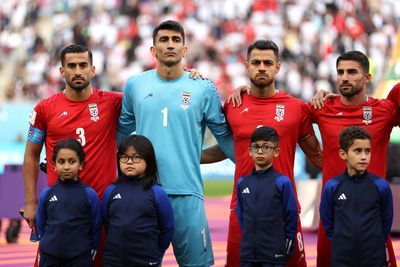 In an apparent protest, Iran's World Cup players refuse to sing the national anthem