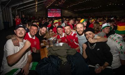 ‘I’m so proud’: Welsh fans revel in first World Cup game since 1958