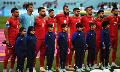 Iran stand with protesters as England and Wales bow to Fifa over armbands