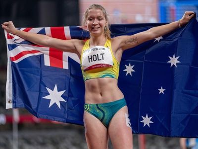 Sprinter Holt calls it a day