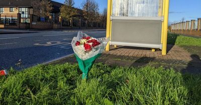 Flowers left for man found dead at Liverpool bus stop