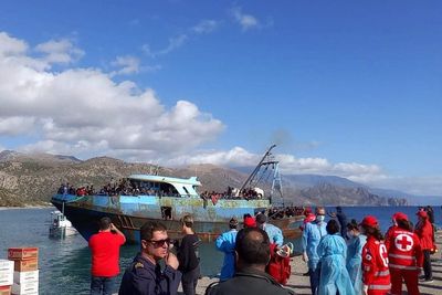 Boat carrying 400 migrants rescued after drifting into rough seas off Crete coast