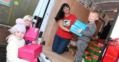 Big hearted youngsters fill hundreds of shoe boxes with Christmas goodies for Third World children