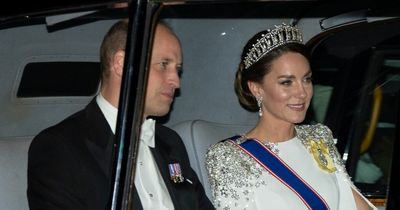 Guests including William and Kate at Charles' first State Banquet sit EXACTLY 45cm apart