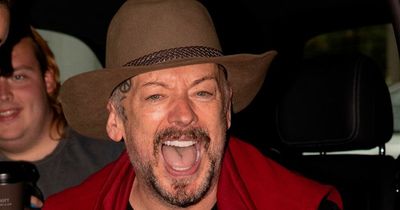 Boy George serenaded by ex campmates as he arrives at hotel following I'm A Celeb exit