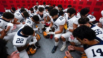 Prayers go on, sometimes out of sight, in prep football