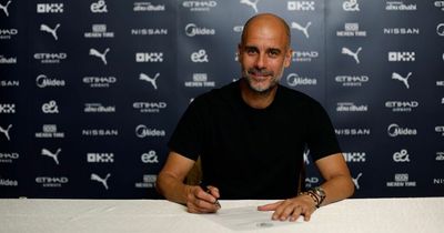 Pep Guardiola signs new Man City contract
