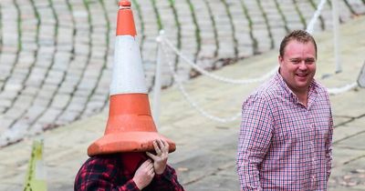Gang member turns up to court with traffic cone on his head as disguise