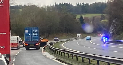 Man rushed to hospital after truck 'flips onto opposite carriageway' on M90