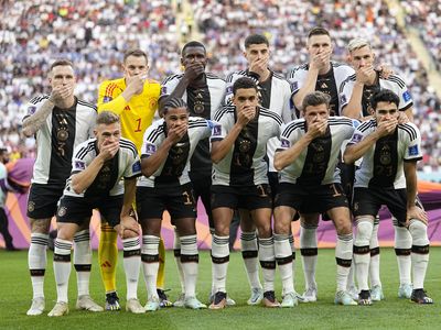 German players cover their mouths at the World Cup to protest FIFA