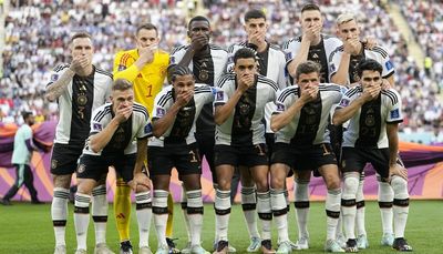 Germany’s World Cup players cover mouths in FIFA protest