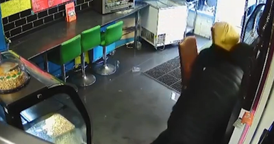 Shocking footage shows hero dad wrestling knife off man in restaurant