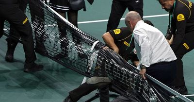 Protestors attempt to tie themselves to net as Davis Cup descends into chaos