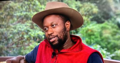I'm A Celebrity's Babatunde was so excited to leave camp he spills Champagne all over himself