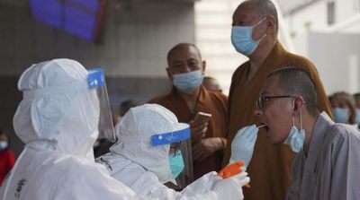 China's Daily Covid Cases Hit Record High