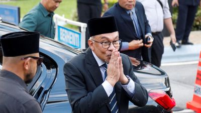Malaysia’s longtime opposition leader Anwar sworn in as PM