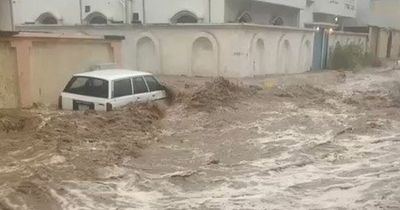 Saudi Arabia flooding: Huge floods cause water to gush down street as cars swept away