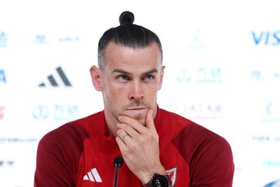 Gareth Bale reacts with Wales captain on cusp of caps record against Iran