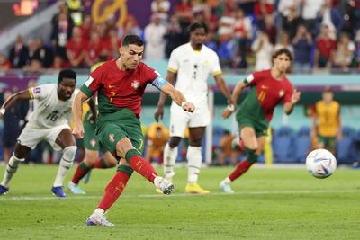 Cristiano Ronaldo makes World Cup history as Portugal hold off Ghana in opener