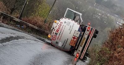 Overturned oil tanker closes busy Valleys road