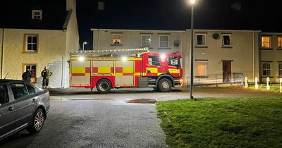 One person taken to hospital after 'house fire' in Inverness as road locked down