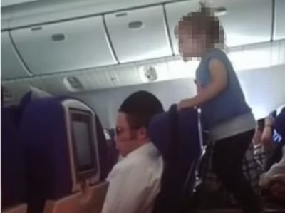 Parents under fire after child filmed ‘running wild’ on flight