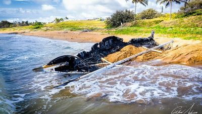 Police investigate fire that destroyed yacht stranded on Emu Park beach