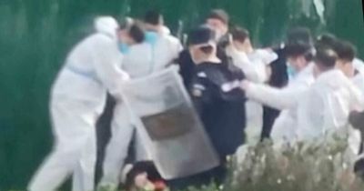Violent protests break out at Apple's biggest iPhone plant in China after fears over delays to iPhone 14 deliveries