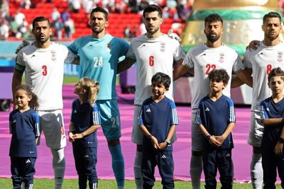 Iran team sing national anthem at World Cup