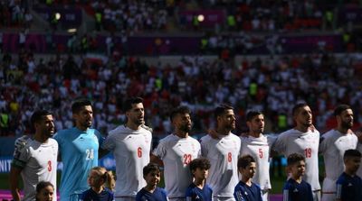 Iran Players Sing National Anthem at World Cup Match