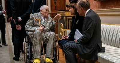 King Charles calls painter David Hockney's bright yellow croc shoes 'beautiful'