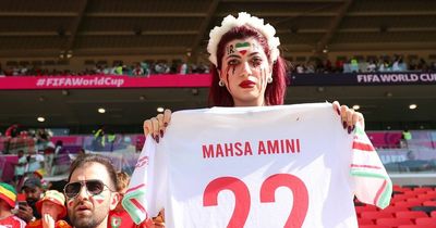 Iran fan has Mahsa Amini shirt confiscated during World Cup match vs Wales amid anthem booing