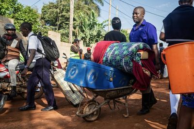 Uganda closes schools to fight Ebola, new cases fall