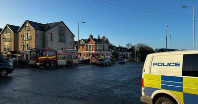 Homes evacuated as fire breaks out in roof of flat block