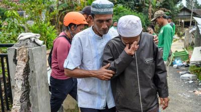 Indonesia Quake Toll Reaches 310 as More Bodies Found
