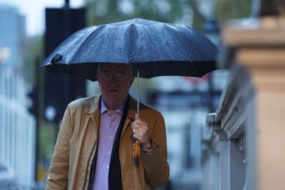 UK weather: Heavy rain to cause further transport delays amid train strike