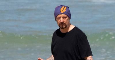 Boy George enjoys beach outing in Surfers Paradise with sister ahead of I'm A Celeb final