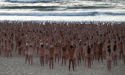 Bondi becomes nude beach as thousands take part in Spencer Tunick’s Sydney installation